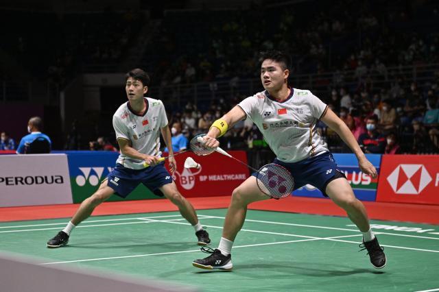 PG模拟器最新版-国羽男单男双携手挺进四强 “梁王”组合成未来之星
